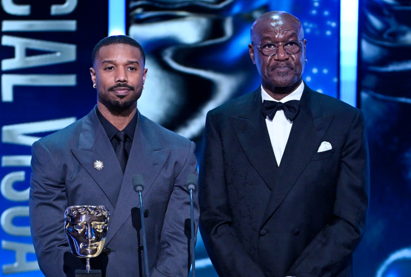 Michael B. Jordan and Delroy Lindo on stage during the EE BAFTA Film Awards (Stuart Wilson/BAFTA/Getty Images for BAFTA)