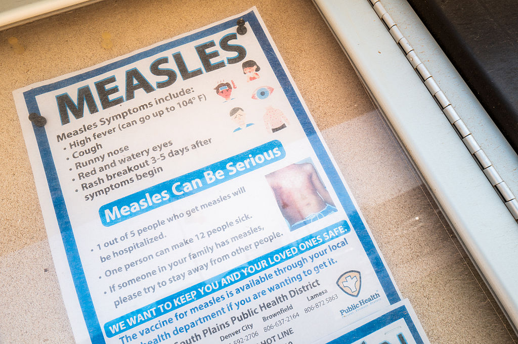 Measles outbreaks continue nationwide as more people grow cautious of childhood vaccination schedules, taking the lead set by anti-vax officials like HHS Secretary Kennedy. (Brandon Bell / Getty Images)