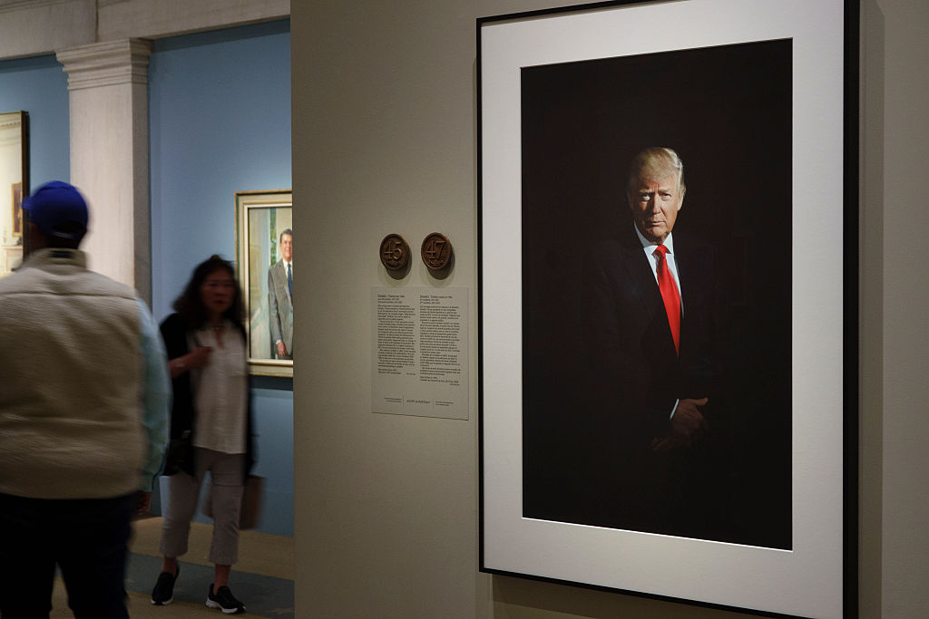 Trump is demanding his portrait from his first administration (seen above) be replaced with one to cover both terms. This continues his editing of the Smithsonian's displays on history including his own biography and major events like slavery. (Kevin Carter / Getty Images)