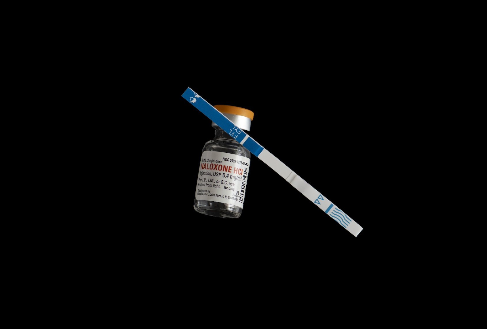 Fentanyl test strip with bottle of life saving Naloxone. (Michael Siluk/UCG/Universal Images Group via Getty Images)
