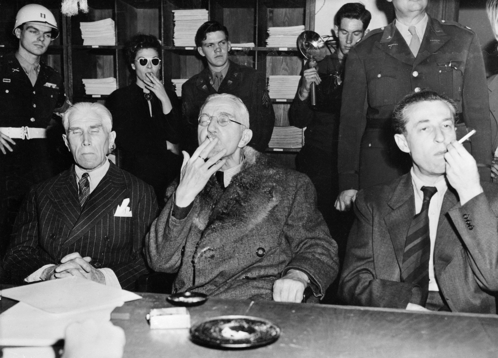 From left: Former Nazi diplomat Franz von Papen, financier Hjalmar Schacht and propaganda chief Hans Fritsche after their acquittal on war crimes charges in Nuremberg, Oct. 4, 1946. (Bettmann/Getty Images)