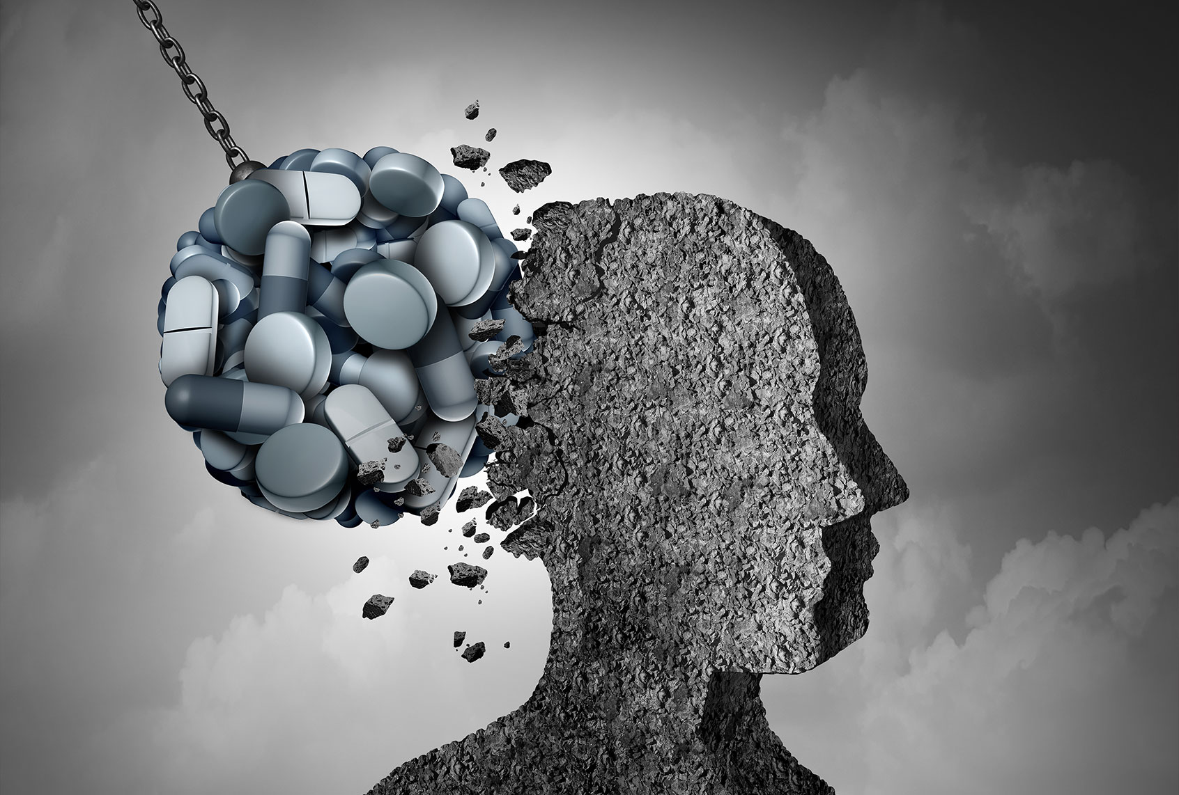 Opioid epidemic health danger and medical crisis with a prescription painkiller addiction concept as a group of pills devastating a patient (Getty Images)