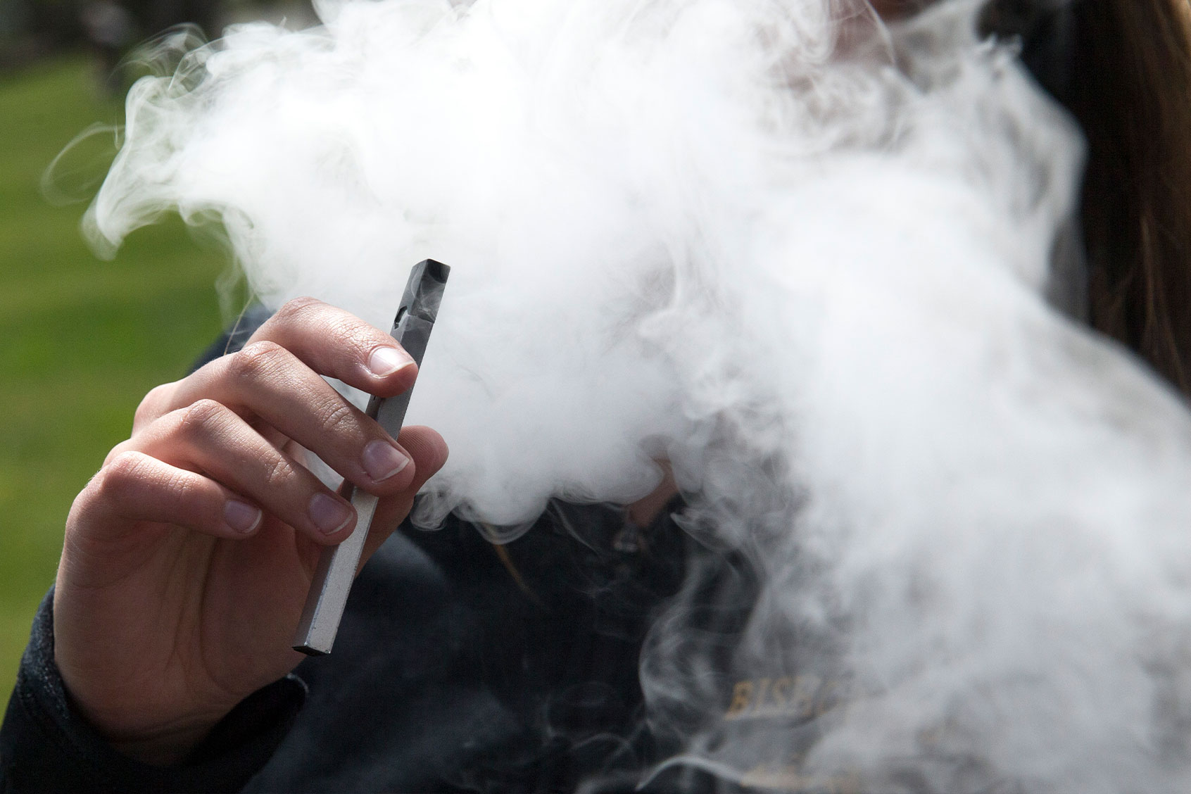 A person smokes a Juul e-cigarette (Jessica Christian/San Francisco Chronicle via Getty Images)