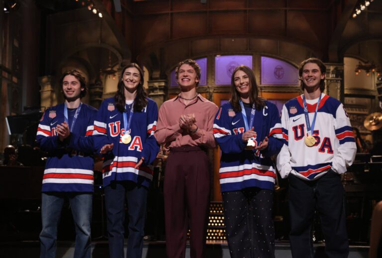 Quinn Hughes, Megan Keller, Connor Storrie, Hilary Knight and Jack Hughes on "Saturday Night Live" (Will Heath/NBC)